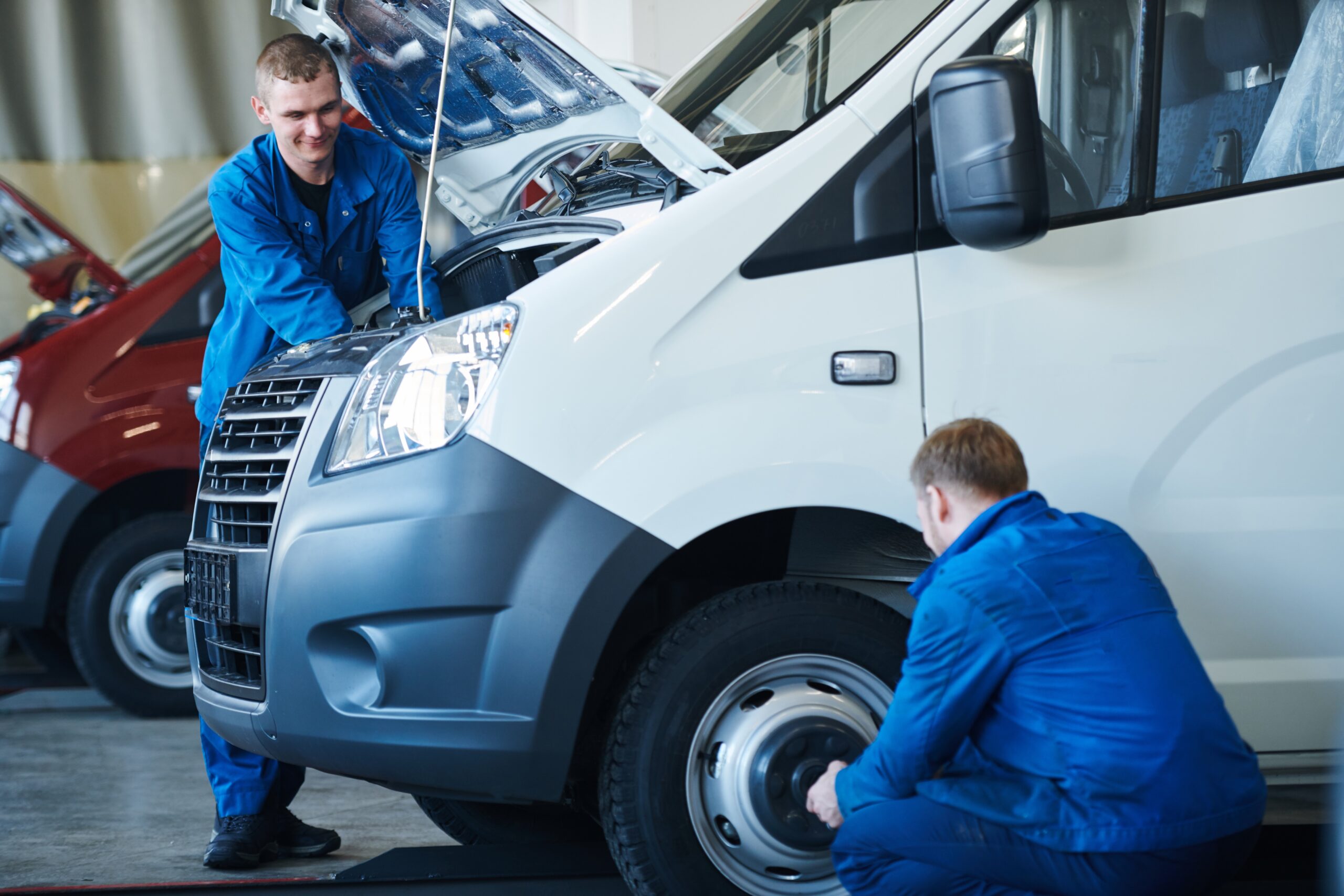 Long term van rentals - image shows two male mechanics fixing a van